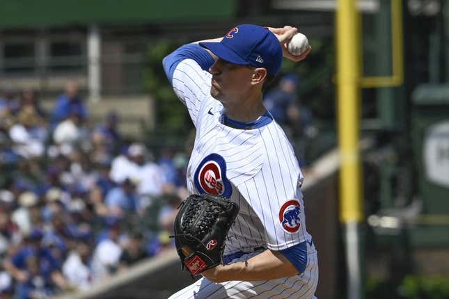 Aug 20, 2023; Chicago, Illinois, USA;  Chicago Cubs starting pitcher Kyle Hendricks (28) delivers against the Kansas City Royals during the first inning at Wrigley Field.