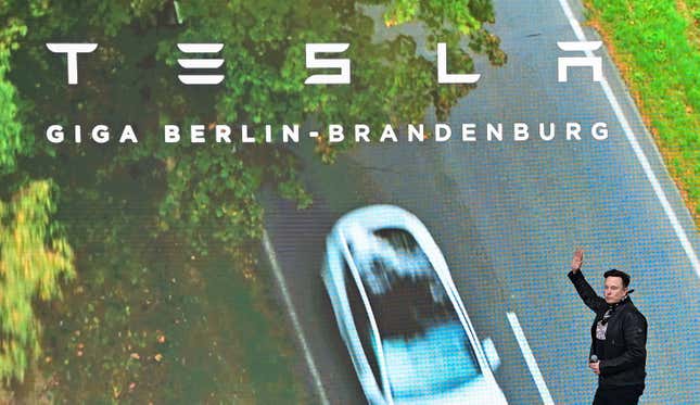09 October 2021, Brandenburg, Grünheide: Elon Musk, Tesla CEO, arrives at an open house on a stage at the Tesla Gigafactory. In Grünheide, east of Berlin, the first vehicles are to roll off the production line from the end of 2021. The US company wants to build around 500,000 Model Ys here every year. 
