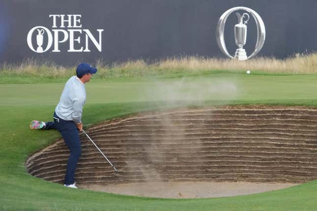 July 20, 2023; Hoylake, England, GBR; Rory McIlroy plays a shot from a bunker on the 18th hole during the first round of The Open Championship golf tournament at Royal Liverpool.