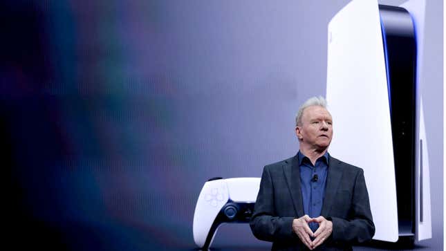 Sony CEO Jim Ryan stands in front of an image of the PlayStation 5 at CES 2023 in Las Vegas.