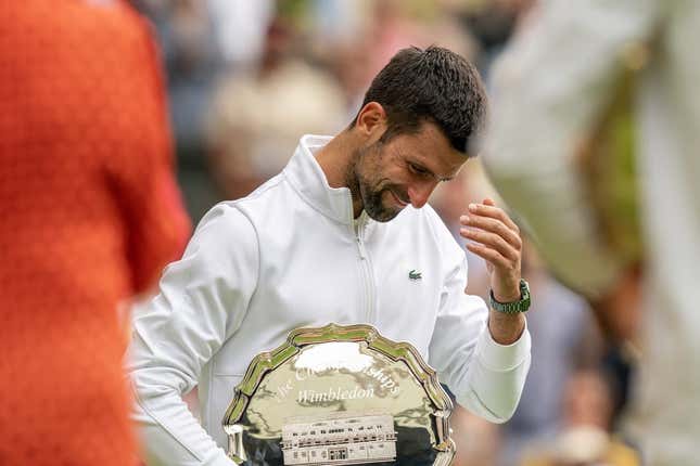 Jul 16, 2023; London, United Kingdom; Novak Djokovic (SRB) at the trophy presentation after losing the men   s singles final against Carlos Alcaraz (ESP)on day 14 at  the All England Lawn Tennis and Croquet Club.
