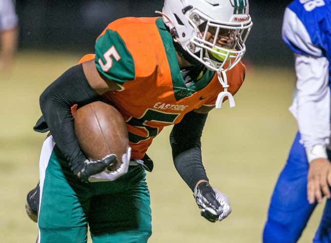Eastside High School Micah Hudson (5) drives as Eastside travels to take on Belleview   Friday, Oct. 21, 2022, at Belleview High School in Belleview, Fla. [Alan Youngblood/Special to the Ocala Star-Banner]

Oca Eastside Vs Belleview Fb