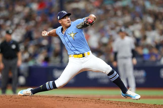 Aug 27, 2023; St. Petersburg, Florida, USA;  Tampa Bay Rays relief pitcher Robert Stephenson (26) throws a pitch  against the New York Yankees in the eighth inning at Tropicana Field.