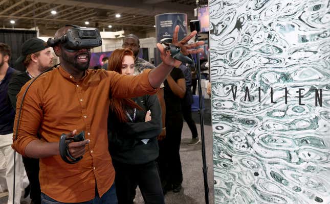 A man uses a virtual reality simulator at a conference in Miami in November. 