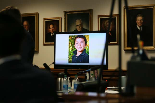 A photo of Sandy Hook victim Jesse Lewis displayed during opening arguments last week. His parents testified in the defamation trial against Alex Jones on Tuesday.

