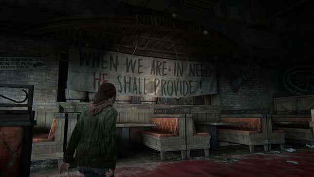 Ellie stands before a sign that reads "When we are in need He shall provide!" in an old restaurant in the game The Last of Us.