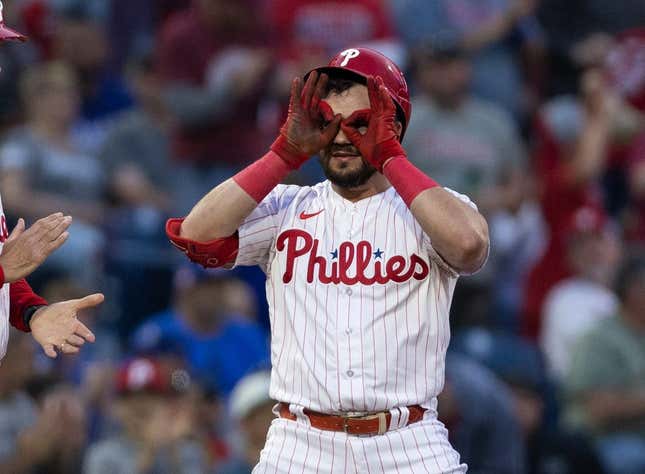 Jun 9, 2023; Philadelphia, Pennsylvania, USA; Philadelphia Phillies left fielder Kyle Schwarber (12) reacts after hitting a triple during the third inning against the Los Angeles Dodgers at Citizens Bank Park.