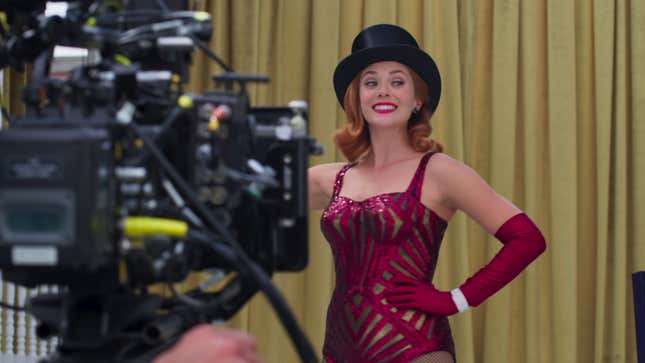 Elizabeth Olsen filming a scene from WandaVision in which Wanda is portraying a magician's stage assistant.
