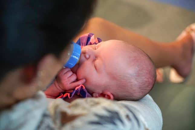Emma feeds her newborn baby, Story, at Winchester Medical Center.