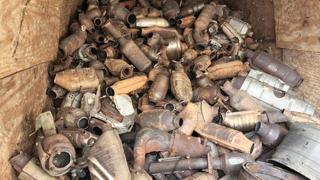 A rusty pile of catalytic converters in the back of a truck in Mineola, New York. 