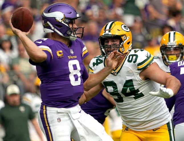 Green Bay Packers defensive end Dean Lowry (94) pressures Minnesota Vikings quarterback Kirk Cousins (8) during the first quarter of their game Sunday, September 11, 2022 at U.S. Bank Stadium in Minneapolis, Minn.

Mjs Packers11 31 Jpg Packers11 114211850