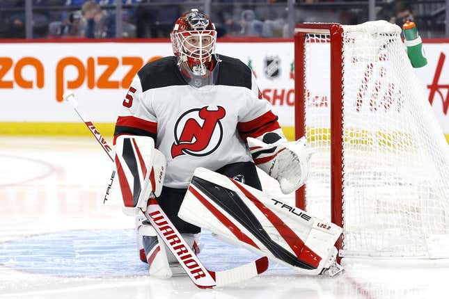 Dec 3, 2021; Winnipeg, Manitoba, CAN; New Jersey Devils goaltender Jonathan Bernier (45) warms up before start of the second period against the Winnipeg Jets at Canada Life Centre.