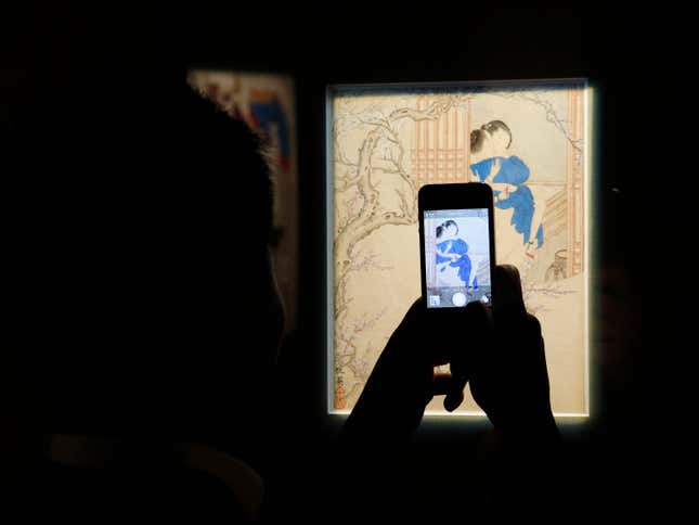 Taking in the "Gardens of Pleasure: Sex in Ancient China" exhibition at the Sotheby's Hong Kong Gallery in April 2014.