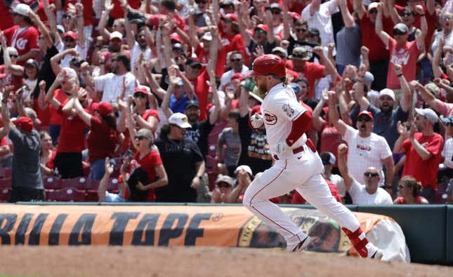 Jun 21, 2023; Cincinnati, Ohio, USA; Cincinnati Reds right fielder Jake Fraley (27) runs after hitting a two-run home run against the Colorado Rockies during the eighth inning at Great American Ball Park.