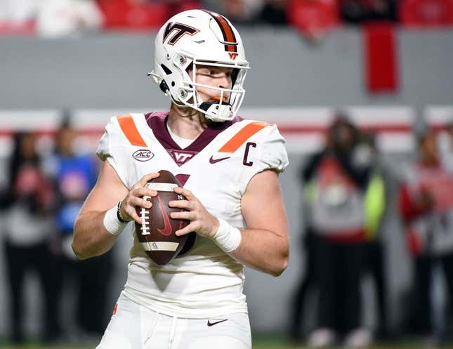 Oct 27, 2022; Raleigh, North Carolina, USA; Virginia Tech Hokies quarterback Grant Wells (6) drops back to pass during the first half against the North Carolina State Wolfpack at Carter-Finley Stadium.