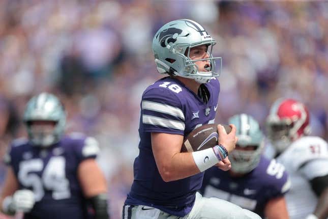 Kansas State senior quarterback Will Howard (18) runs in for a touchdown in the third quarter of Saturday&#39;s game against Troy inside Bill Snyder Family Stadium.
