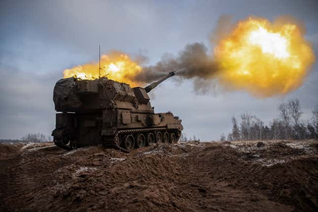Ukrainian soldiers fire from a Polish-made Krab Howitzer with parts sourced from South Korea.