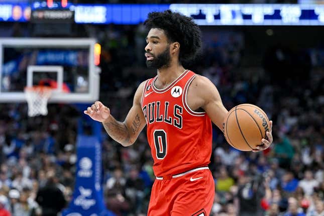 Apr 7, 2023; Dallas, Texas, USA; Chicago Bulls guard Coby White (0) brings the ball up court against the Dallas Mavericks during the first half at the American Airlines Center.