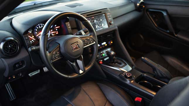 A photo of the interior of a Nissan GT-R sports car. 