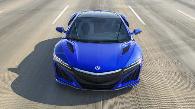 Blue 2017 Acura NSX front view driving on road