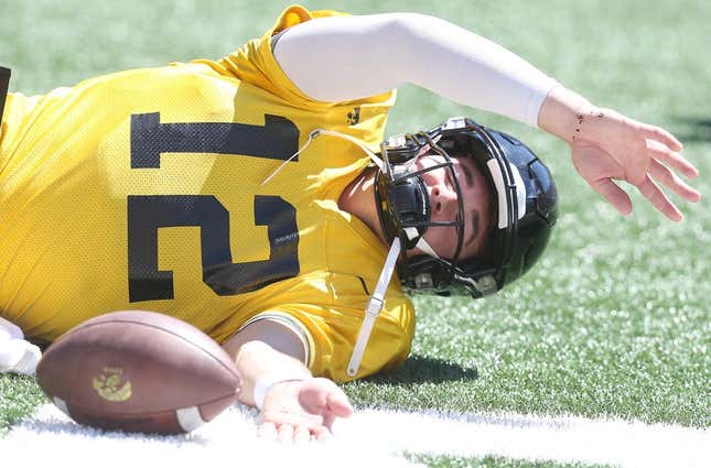 Iowa quarterback Cade McNamara warms up before scrimmaging during Kids&#39; Day at Kinnick at Kinnick Stadium on Saturday, Aug. 12, 2023, in Iowa City, Iowa