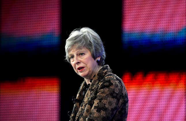Britain's Prime Minister Theresa May replies to questions after speaking at the Confederation of British Industry's (CBI) annual conference in London