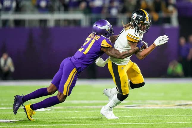 Dec 9, 2021; Minneapolis, Minnesota, USA; Pittsburgh Steelers wide receiver Chase Claypool (11) is tackled by Minnesota Vikings cornerback Bashaud Breeland (21) during the fourth quarter at U.S. Bank Stadium.