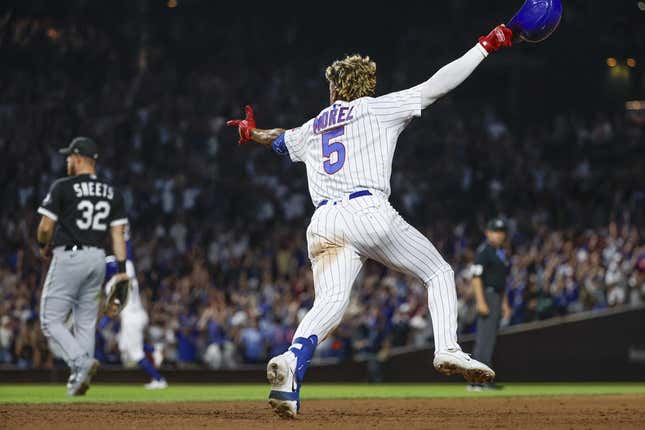 Aug 16, 2023; Chicago, Illinois, USA; Chicago Cubs second baseman Christopher Morel (5) celebrates as he rounds the bases after hitting a three-run walk-off home run against the Chicago White Sox during the ninth inning at Wrigley Field.