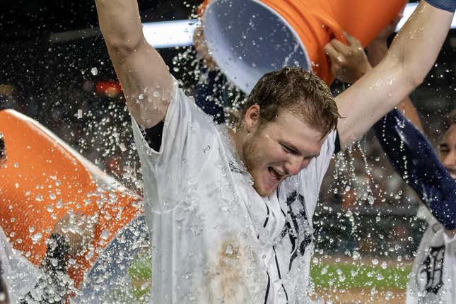 Aug 26, 2023; Detroit, Michigan, USA; Detroit Tigers center fielder Parker Meadows (22) gets showered with water after hitting a walk off three run home run to defeat the Houston Astros in the ninth inning at Comerica Park.