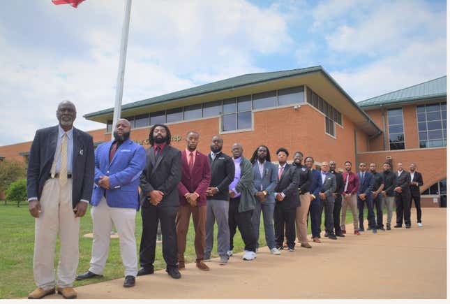 Black male faculty and staff members from Cardinal Ritter College Prep