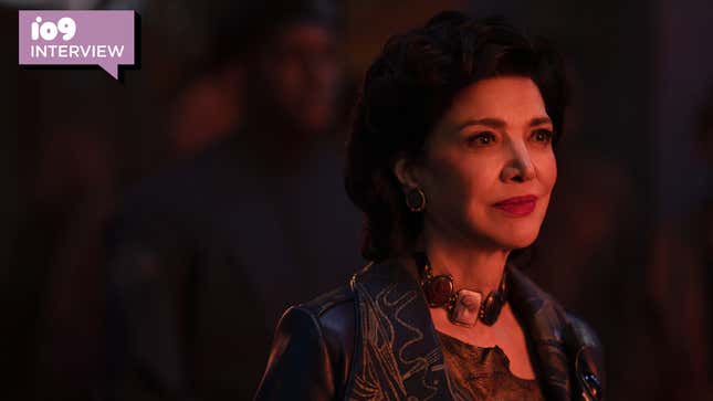 Chrisjen Avasarala (Shohreh Aghdashloo) wears an elaborate necklace and stares off camera in a scene from The Expanse.