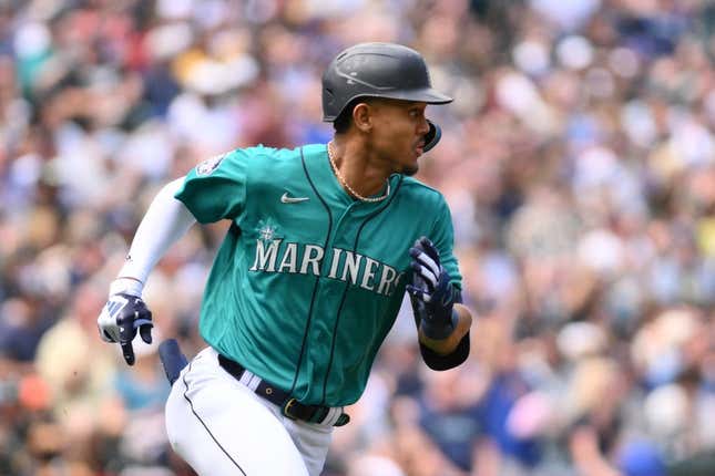 May 27, 2023; Seattle, Washington, USA; Seattle Mariners center fielder Julio Rodriguez (44) runs towards first base after hitting an RBI double against the Pittsburgh Pirates during the second inning at T-Mobile Park.