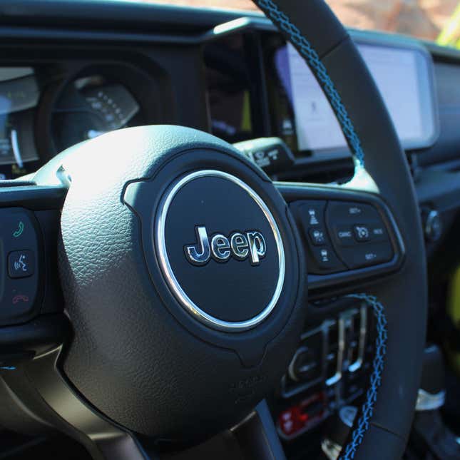 A photo of the steering wheel on a Jeep Wrangler.
