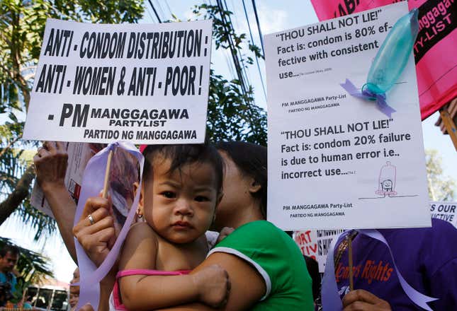 Protesters march in response to the escalating numbers of Filipinos infected with HIV during a protest in front of the Catholic Bishops Conference of the Philippines in Manila March 8, 2010.