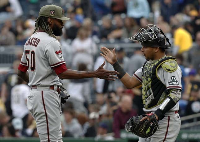 May 20, 2023; Pittsburgh, Pennsylvania, USA;  Arizona Diamondbacks relief pitcher Miguel Castro (50) and catcher Gabriel Moreno (14) shake hands after defeating the Pittsburgh Pirates during at PNC Park.The Diamondbacks won 4-3.