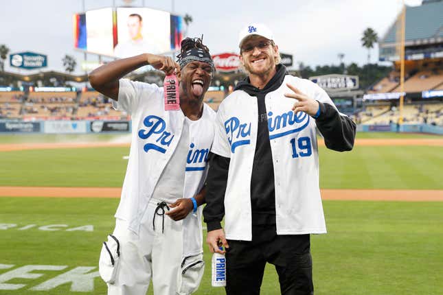 KSI (l.) and Logan Paul pose with Prime hydration bottles prior to a game between the Arizona Diamondbacks and Los Angeles Dodgers