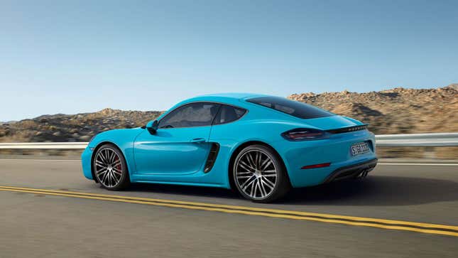 A photo of a blue Porsche Cayman sports car. 