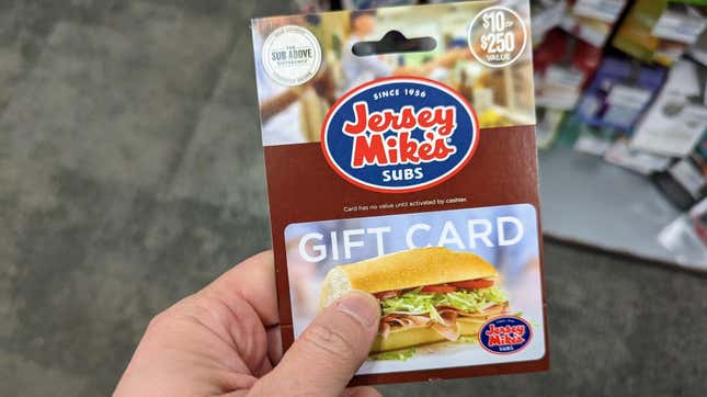 hand holding gift card