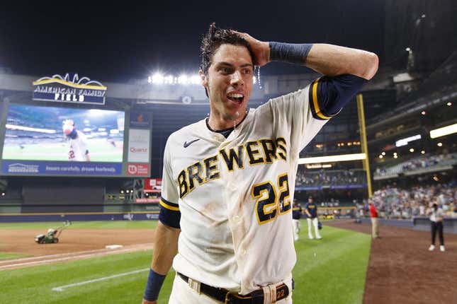 Jul 24, 2023; Milwaukee, Wisconsin, USA; Milwaukee Brewers left fielder Christian Yelich (22) reacts after being dunked with Gatorade following the game against the Cincinnati Reds at American Family Field.