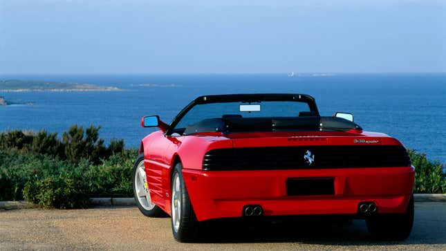 A photo of the rear end of a red Ferrari 348. 