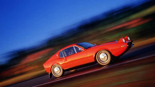 A photo of a red Saab Sonett III sports car. 