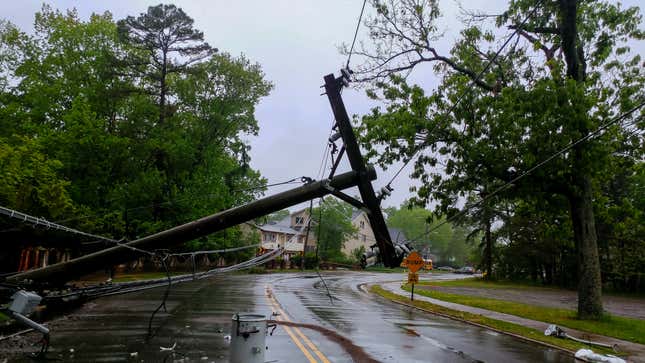 Downed power lines across a road after a storm