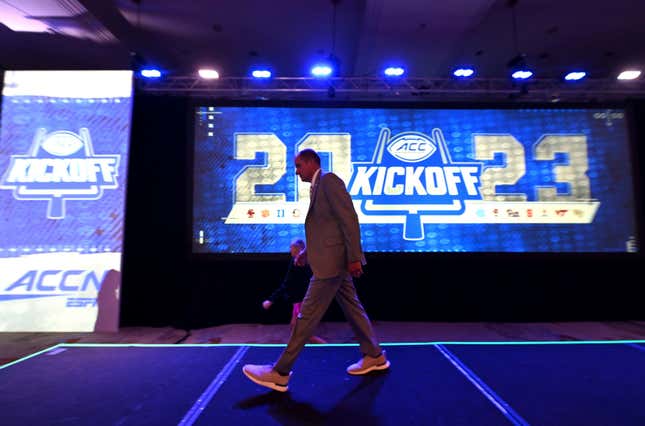 Atlantic Coast Conference Commissioner James Phillips leaves the stage following his presentation during the first day of the ACC media days