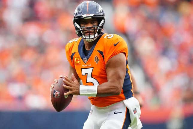 Sep 10, 2023; Denver, Colorado, USA; Denver Broncos quarterback Russell Wilson (3) prepares to pass to wide receiver Courtland Sutton (14) (not pictured) who scored a touchdown in the second quarter against the Las Vegas Raiders at Empower Field at Mile High.
