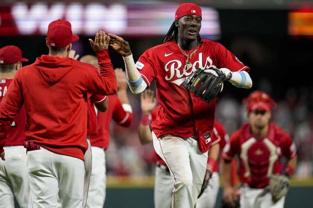 Jun 20, 2023; Cincinnati, Ohio, USA;  Cincinnati Reds third baseman Elly De La Cruz (44) runs for the clubhouse as the Reds celebrate a win after the ninth inning against the Colorado Rockies at Great American Ball Park.