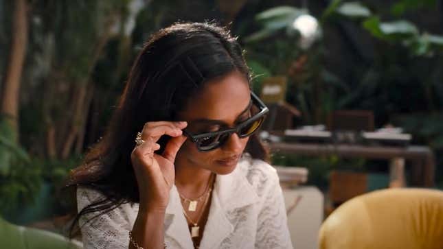 A DJ presses the video trigger button on a pair of Ray-Ban Stories smart glasses.