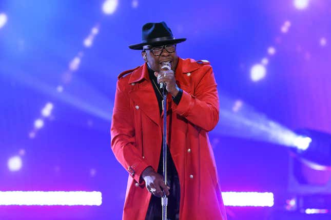 Only Bobby Brown and Carmen Sandiego could make this outfit work.