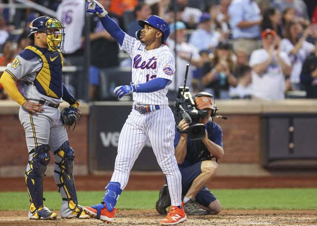 Jun 27, 2023; New York City, New York, USA; New York Mets shortstop Francisco Lindor (12) celebrates after his solo home run during the fourth inning against the Milwaukee Brewers at Citi Field.