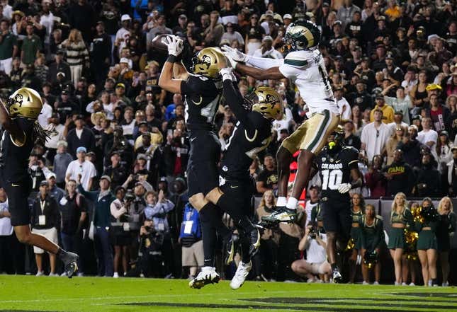 Sep 16, 2023; Boulder, Colorado, USA; Colorado Buffaloes safety Trevor Woods (43) intercepts the ball to end the double overtime game against the Colorado State Rams at Folsom Field.