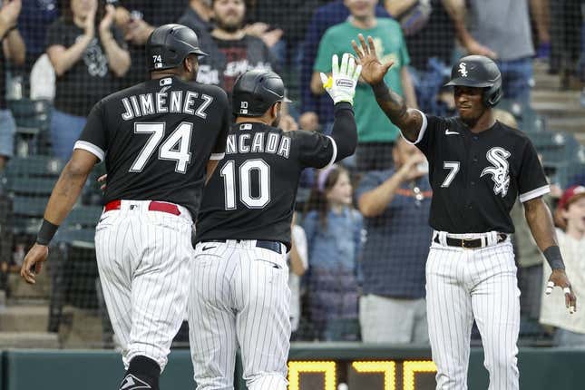 Aug 26, 2023; Chicago, Illinois, USA; Chicago White Sox third baseman Yoan Moncada (10) celebrates with shortstop Tim Anderson (7) after hitting a three-run home run against the Oakland Athletics during the third inning at Guaranteed Rate Field.
